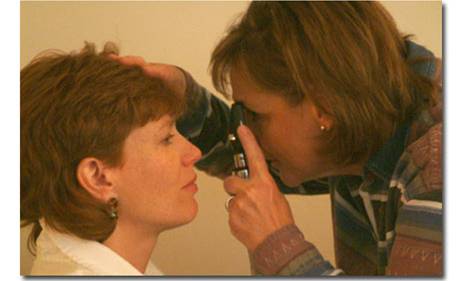 Photograph of a direct ophthalmoscopic examination