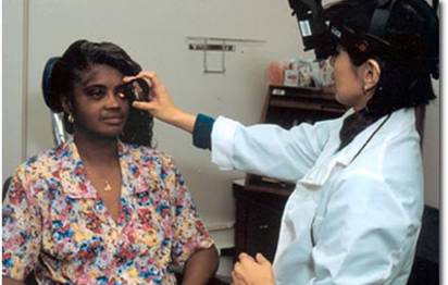 Photograph of an indirect ophthalmoscopic examination